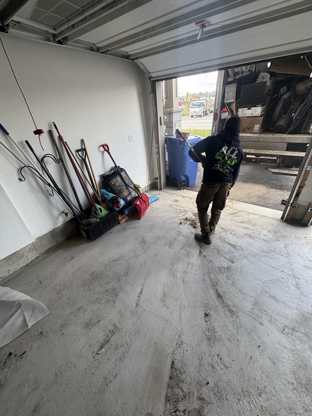 All Clear crew finishing a garage cleanout