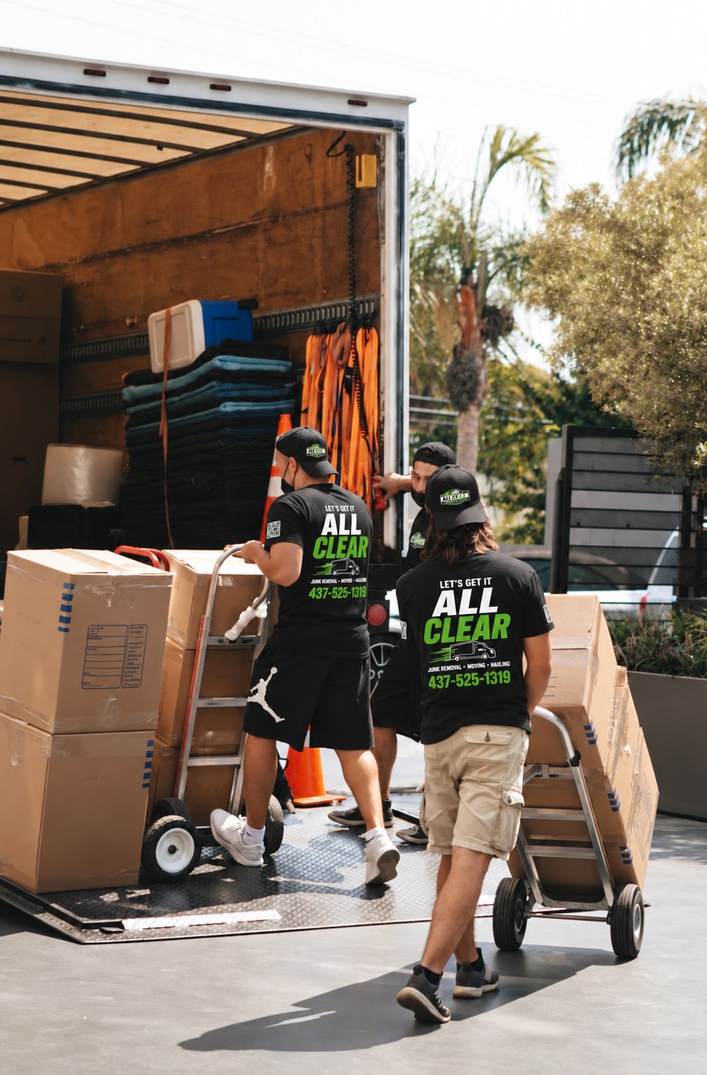 All Clear crew loading boxes onto the truck for a move